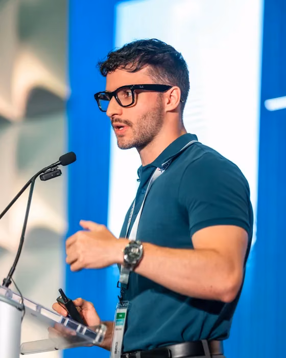 Matthew Schneider giving a keynote at the American Property Expo in Miami, Florida about blockchain technology and real estate tokenization