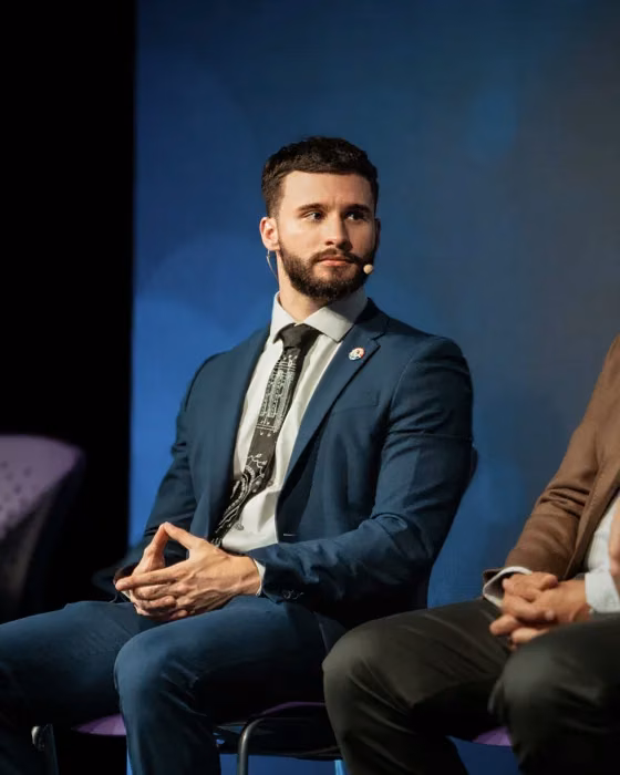 Matthew Schneider speaking at Boston Blockchain Week on the real estate tokenization panel