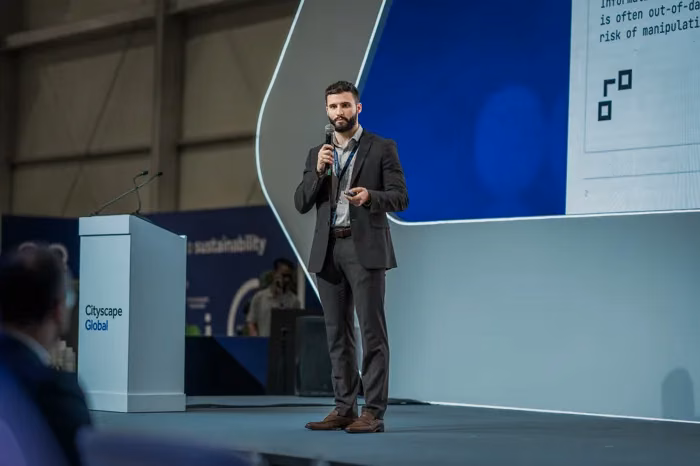 Matthew Schneider speaking at Cityscape Global Saudi in Riyadh, Saudi Arabia about blockchain technology and real estate tokenization