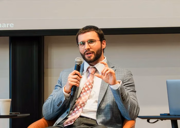 Matthew Schneider speaking in Detroit, Michigan as part of a panel produced by Stand With Crypto and the Michigan Blockchain Council