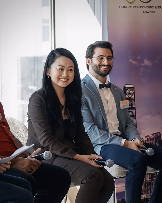 Matthew Schneider speaking with Tracy Lai at a FinTech Summit hosted by the Hong Kong Association of Atlanta, Hong Kong Economic Trade Office, and InvestHK